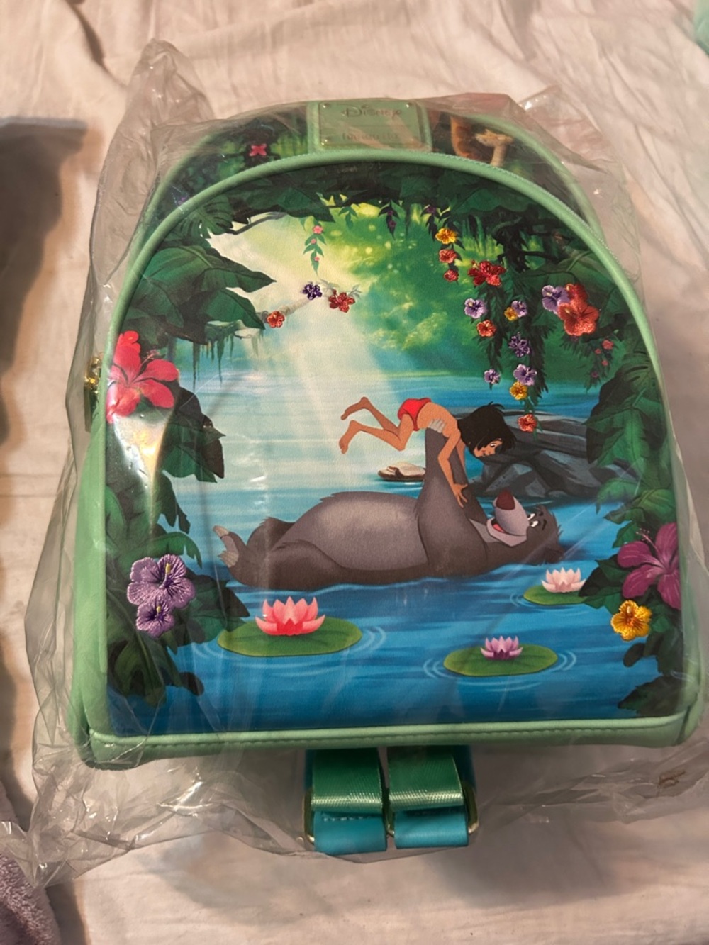 Disney Mint Green Jungle Book Mini Backpack with Colorful Floral Print